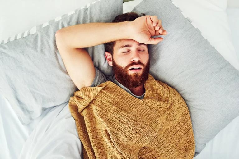Patient resting after dental procedure for comfort and recovery